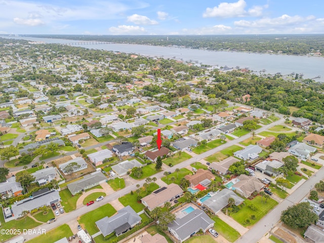 drone / aerial view with a water view