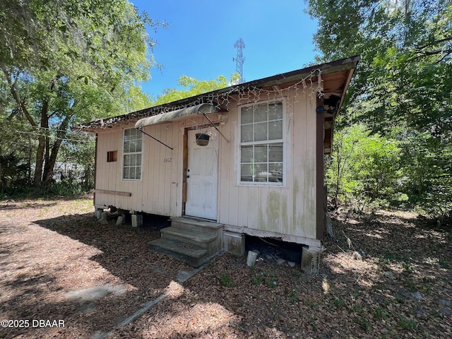 1412 Wood St, Deland, FL 32724 - view of outdoor structure featuring entry steps
