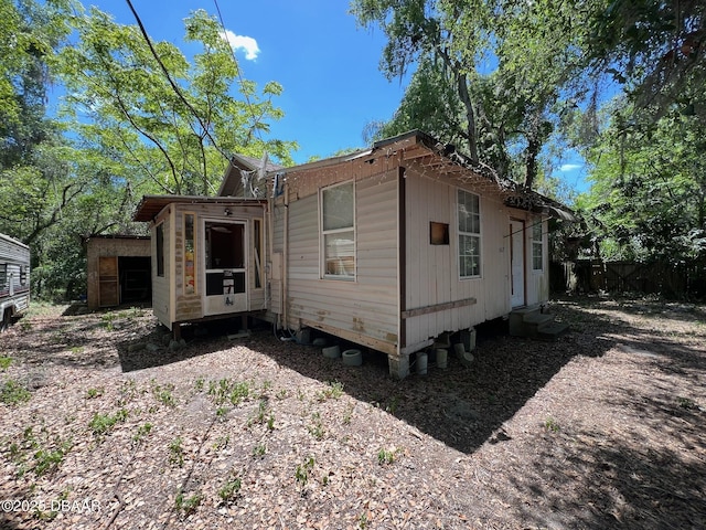 1412 Wood St, Deland, FL 32724 - view of home's exterior with entry steps