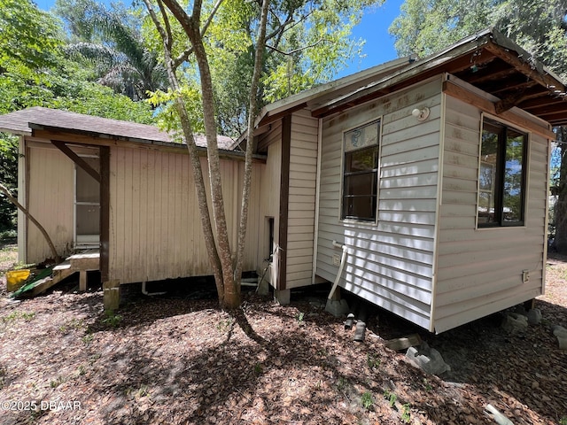 1412 Wood St, Deland, FL 32724 - view of home's exterior featuring an outdoor structure