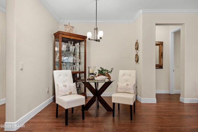 living area with crown molding, dark hardwood / wood-style floors, and a notable chandelier