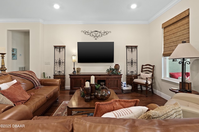 living room with dark hardwood / wood-style floors and ornamental molding