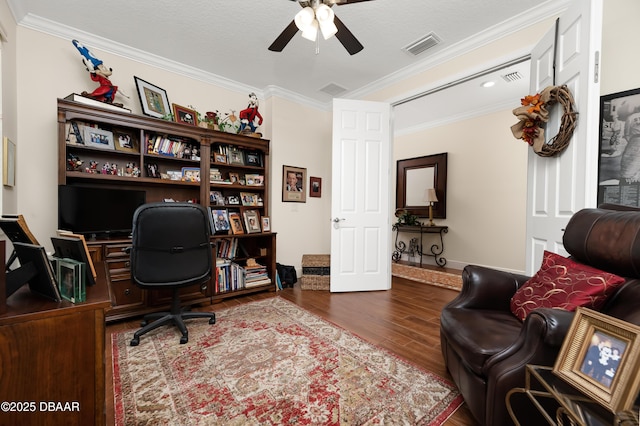 office featuring hardwood / wood-style flooring, crown molding, and ceiling fan