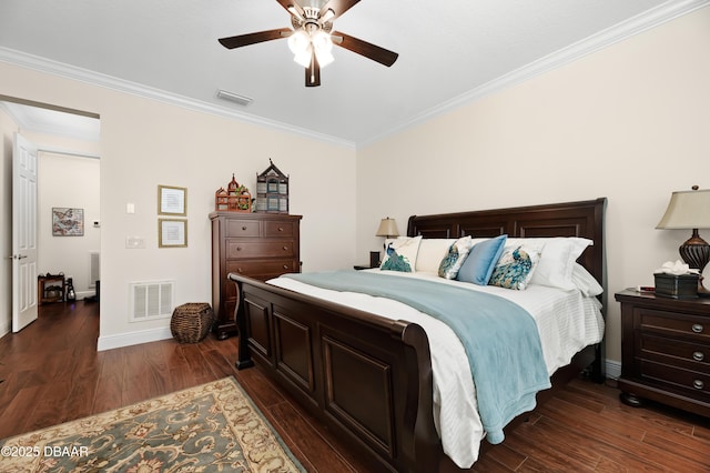 bedroom featuring ceiling fan, dark hardwood / wood-style flooring, and crown molding