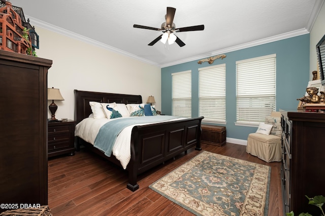 bedroom featuring ceiling fan, dark hardwood / wood-style flooring, and crown molding