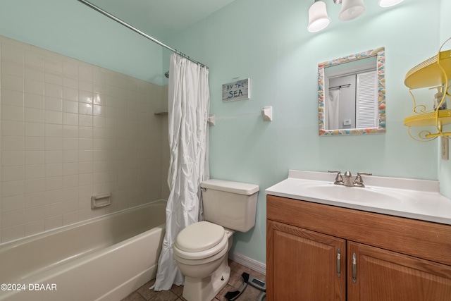 full bathroom featuring shower / bath combo, vanity, tile patterned floors, and toilet