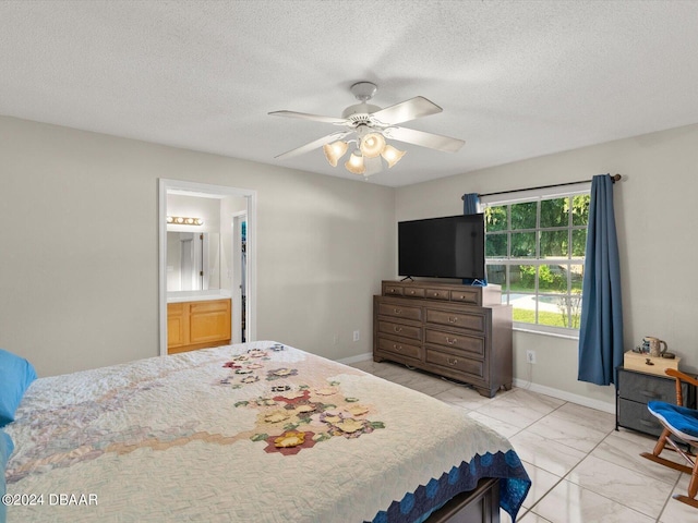 bedroom with a textured ceiling, baseboards, marble finish floor, and ceiling fan