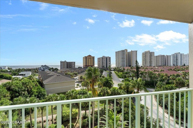 balcony featuring a water view