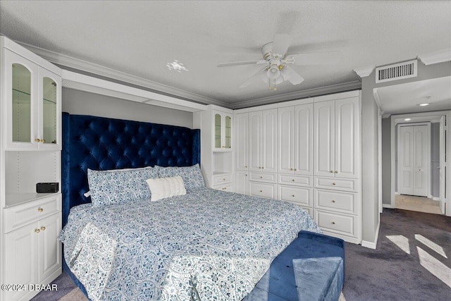 bedroom with ornamental molding, a textured ceiling, ceiling fan, and dark carpet