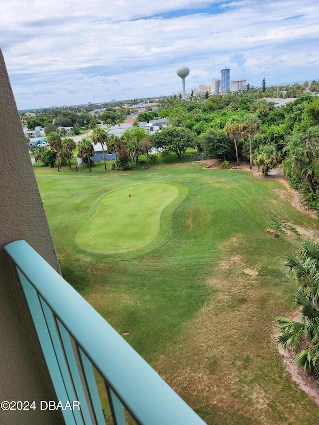 view of property's community featuring a lawn