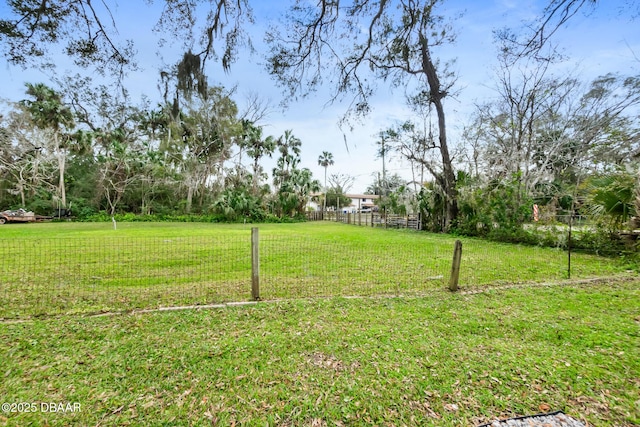 view of yard featuring fence