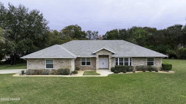 ranch-style home with a front yard