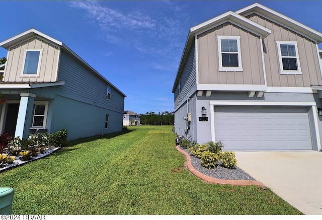 exterior space featuring a garage and a yard