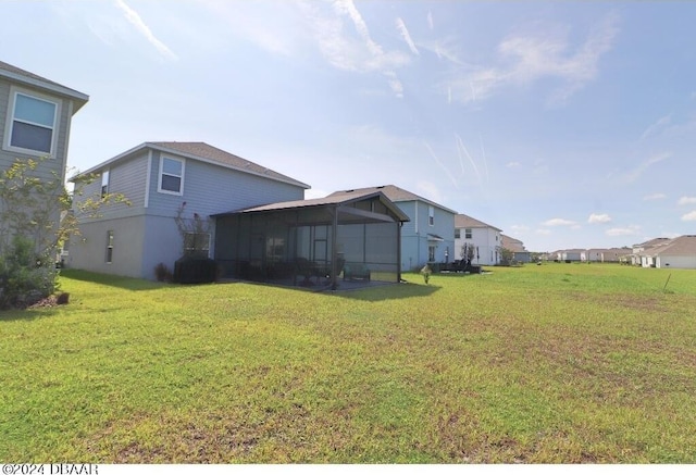 view of yard featuring a sunroom