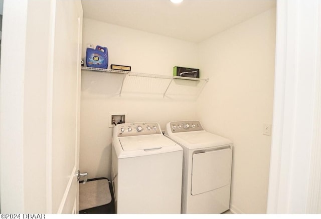 laundry room with washer and dryer