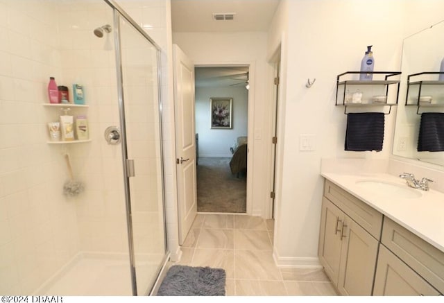 bathroom with vanity and an enclosed shower