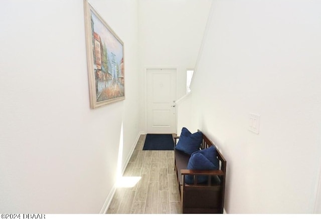 corridor featuring light hardwood / wood-style flooring