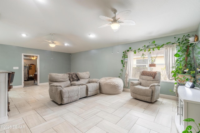 living room with ceiling fan