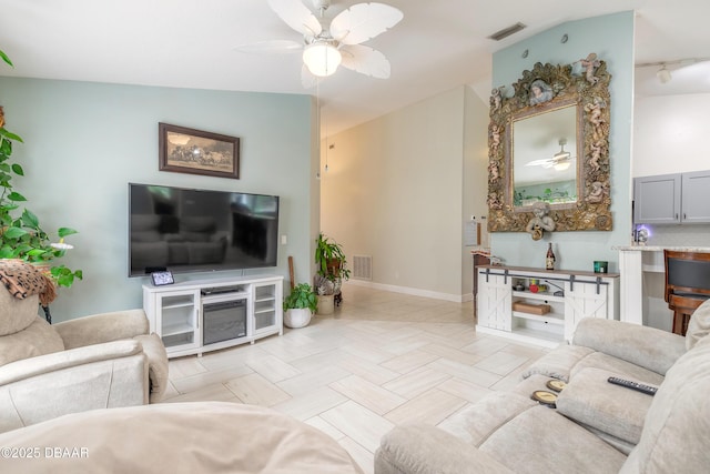 living room with ceiling fan