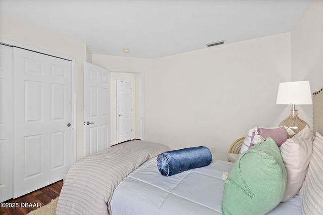 bedroom featuring wood finished floors