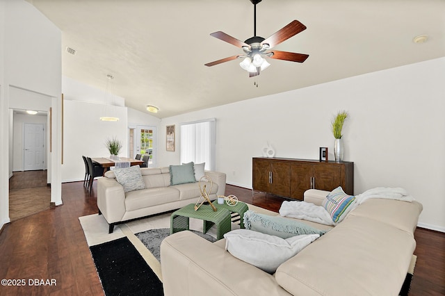 living room featuring lofted ceiling, ceiling fan, and wood finished floors