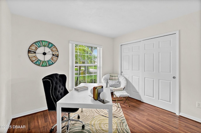 office with wood finished floors and baseboards