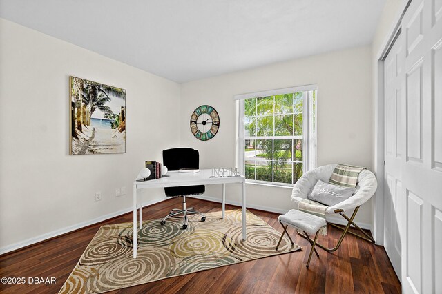 office with wood finished floors and baseboards