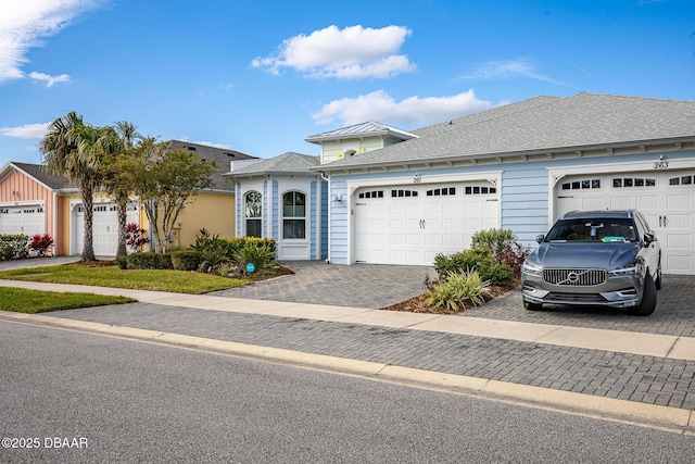 view of front of property featuring a garage