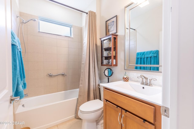 full bathroom with tile patterned floors, vanity, toilet, and shower / tub combo