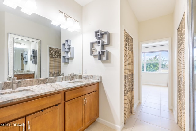 bathroom featuring tile patterned floors and vanity