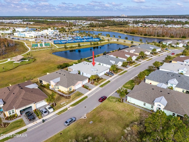 bird's eye view with a water view