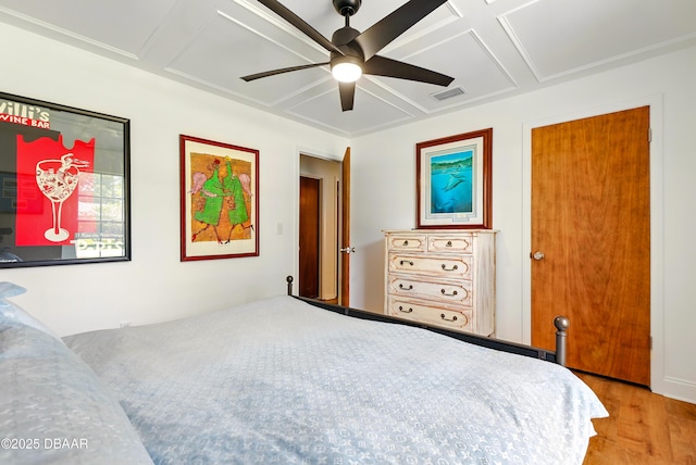 2530 Nordman Ave, New Smyrna Beach, FL 32168 - bedroom with wood finished floors and a ceiling fan