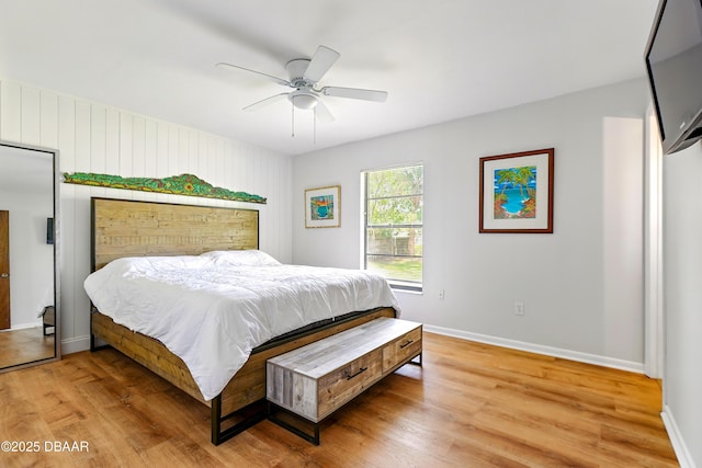 2530 Nordman Ave, New Smyrna Beach, FL 32168 - bedroom with light wood finished floors, baseboards, and a ceiling fan