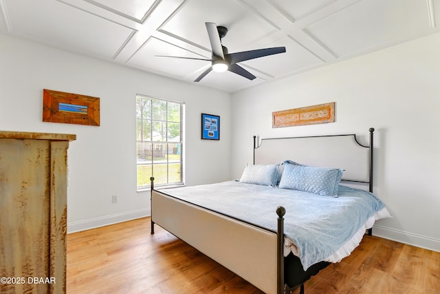 2530 Nordman Ave, New Smyrna Beach, FL 32168 - bedroom with coffered ceiling, baseboards, light wood finished floors, and ceiling fan