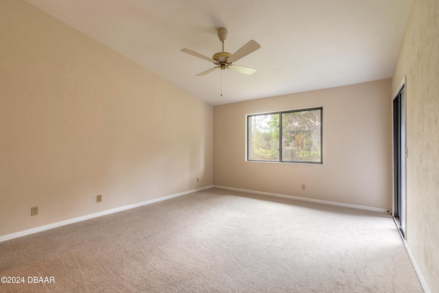 empty room with light colored carpet and ceiling fan