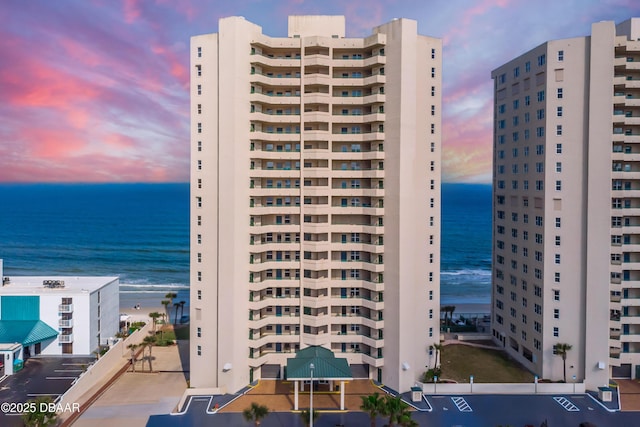 outdoor building at dusk with a water view