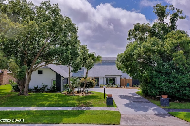 ranch-style house with a front yard