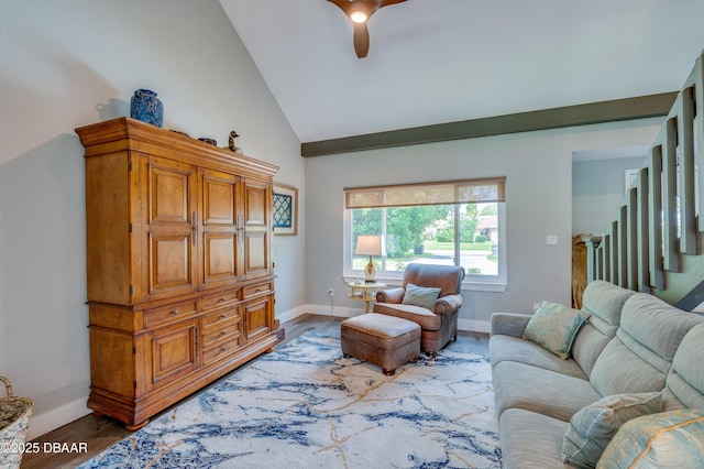 living room featuring ceiling fan, wood-type flooring, and high vaulted ceiling