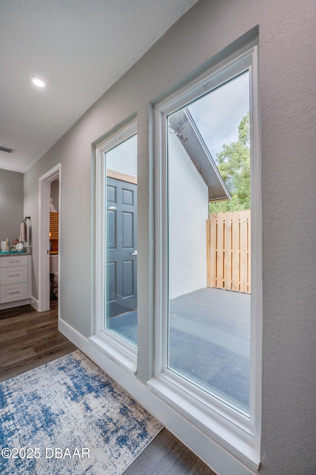 entryway featuring dark wood-type flooring