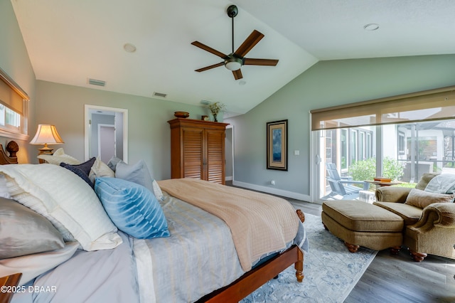 bedroom with light hardwood / wood-style floors, multiple windows, ceiling fan, and access to outside