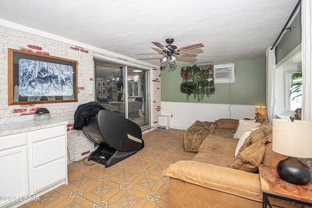 792 N Beach St, Ormond Beach, FL 32174 - living area with an AC wall unit, ceiling fan, light tile patterned floors, wainscoting, and brick wall