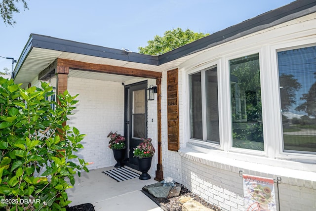 792 N Beach St, Ormond Beach, FL 32174 - view of exterior entry featuring brick siding