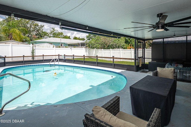 792 N Beach St, Ormond Beach, FL 32174 - view of swimming pool with outdoor lounge area, a fenced backyard, a ceiling fan, and a patio