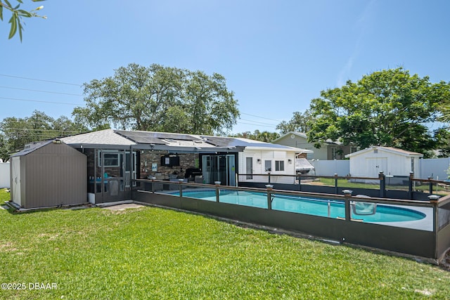 792 N Beach St, Ormond Beach, FL 32174 - view of pool featuring a storage shed and a fenced backyard