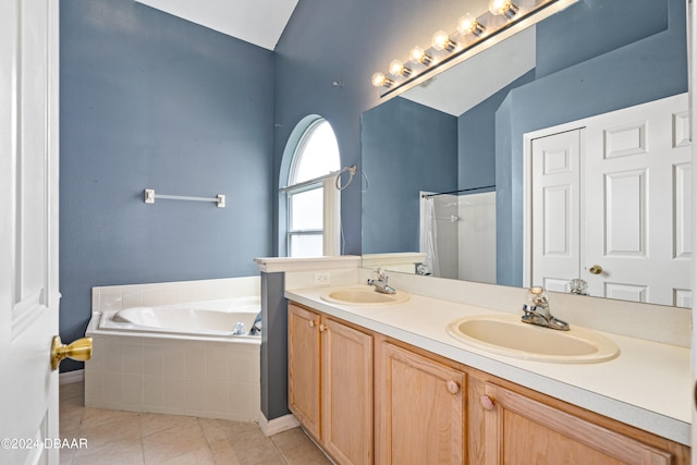 bathroom with vanity, tile patterned floors, and independent shower and bath