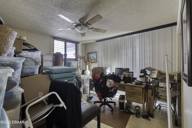 home office with ceiling fan and a textured ceiling