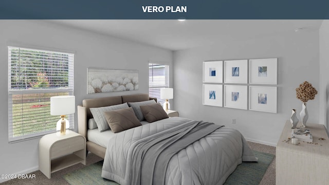 bedroom featuring carpet and multiple windows