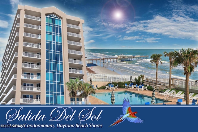 3737 S Atlantic Ave Unit 504, Daytona Beach Shores, FL 32118 - community pool featuring a water view