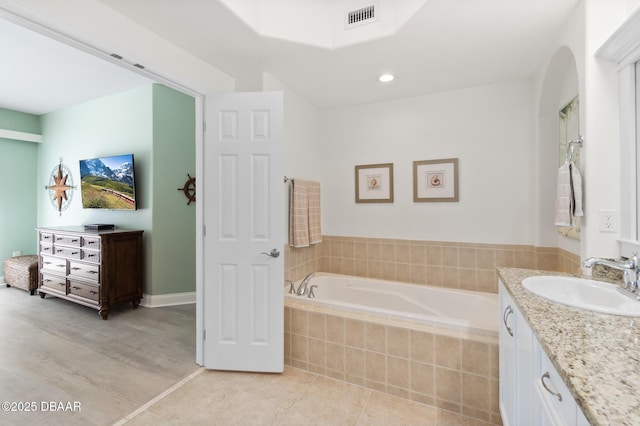 3737 S Atlantic Ave Unit 504, Daytona Beach Shores, FL 32118 - full bathroom featuring vanity, a garden tub, tile patterned floors, and recessed lighting