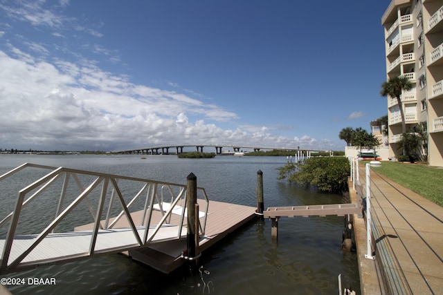 dock area with a water view